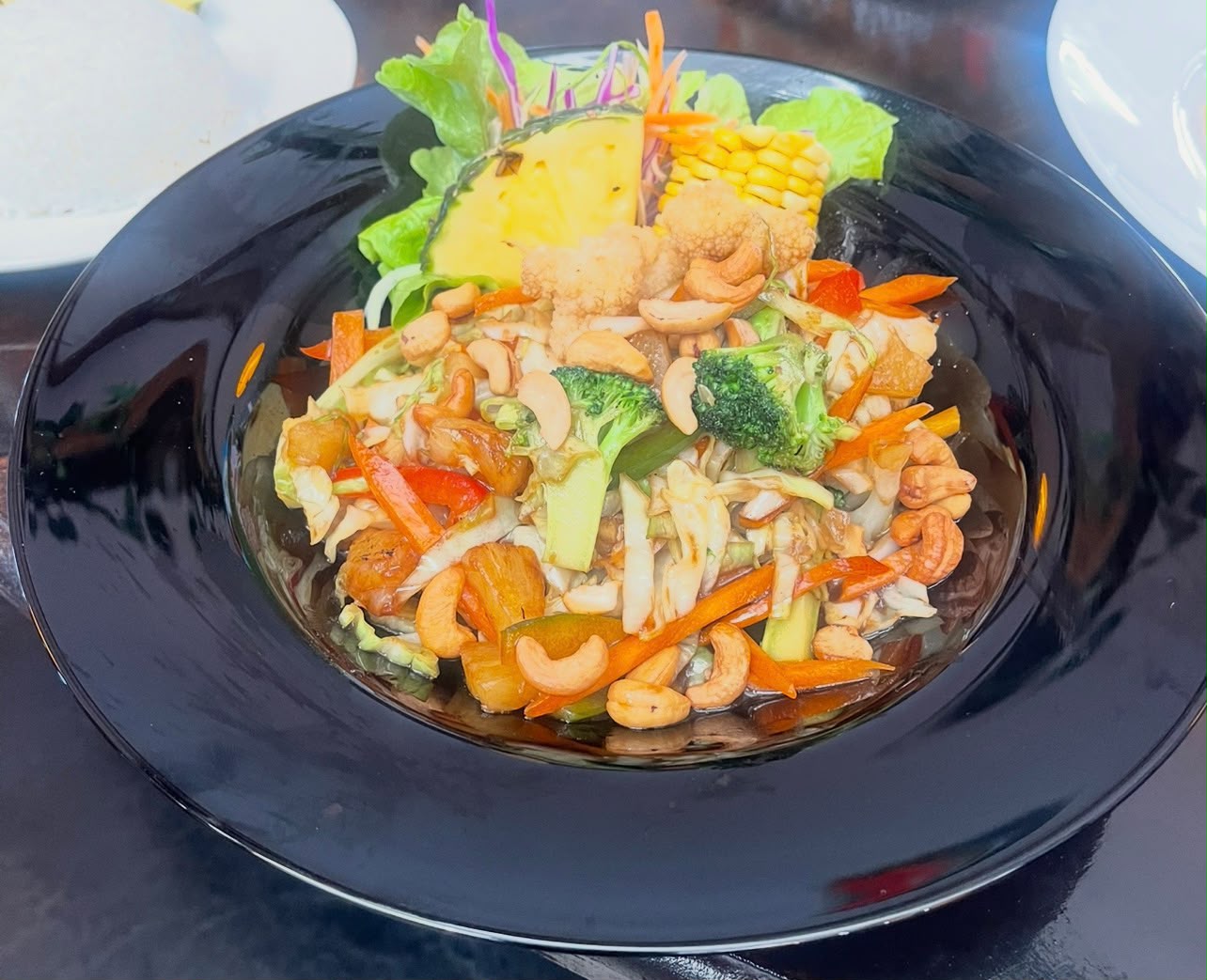 Cashew vegetable stir-fry with pineapple and corn