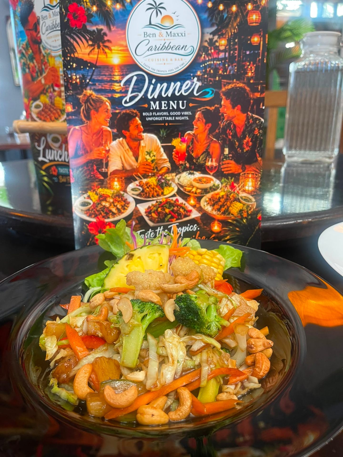 Cashew vegetable stir-fry with dinner menu backdrop